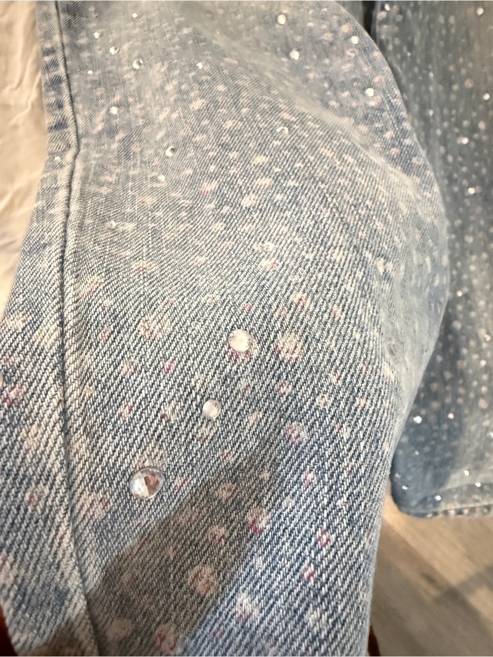 Light Blue Women’s Jeans with Subtle Floral Print and Rhinestone Accents